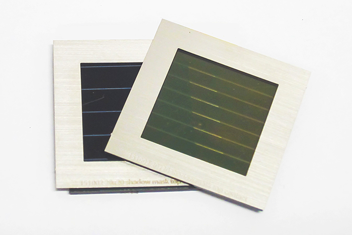 Prototype tandem solar module made up of a semitransparent perovskite solar module (on top) and a CIGS solar module (below). (Picture: imec/ZSW/KIT)